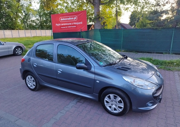 Peugeot 206 plus cena 11900 przebieg: 99875, rok produkcji 2009 z Szczecin małe 352